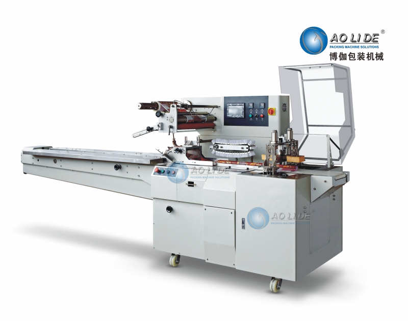 BG-450W往復(fù)式上走膜枕式包裝機.jpg BG-450W往復(fù)式上走膜枕式包裝機.jpg